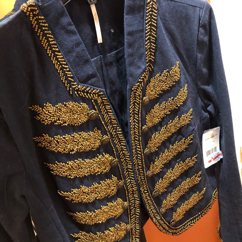 Blue blazer with gold decals